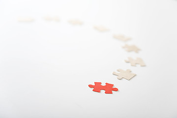 Image showing red piece of puzzle