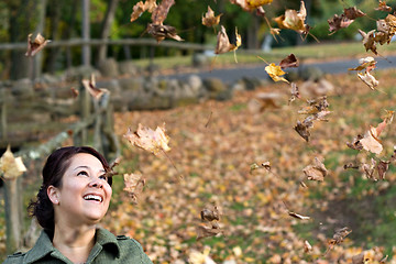 Image showing Falling Leaves Girl