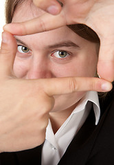 Image showing business woman framing fringers