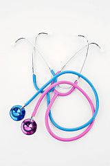 Image showing pink and blue stethoscopes