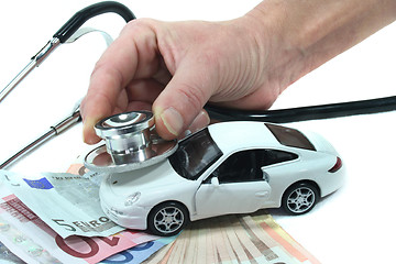 Image showing Stethoscope with car and money