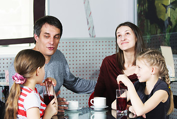 Image showing Dad talking to daughter