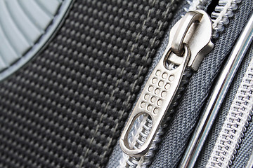 Image showing A zipper on the suitcase