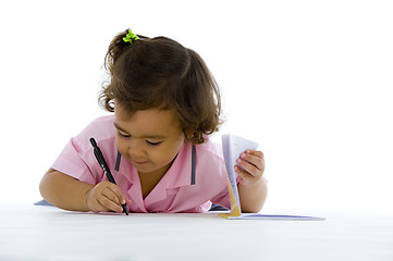 Image showing cute girl writing