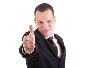 Image showing businessman with thumb raised as a sign of success