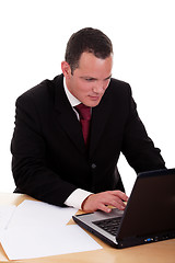 Image showing businessman   looking to computer