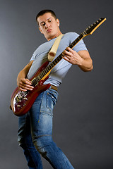 Image showing  passionate guitarist