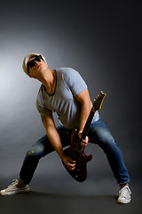 Image showing passionate guitarist