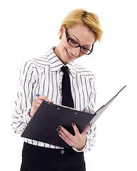 Image showing Businesswoman writing