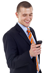Image showing businessman texting on phone