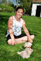 Image showing Girl With Her Puppy