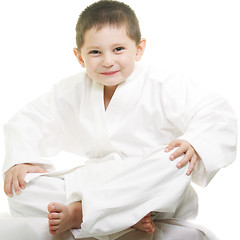 Image showing Little karate kid legs crossed