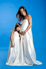 Image showing Pregnant woman with her daughter