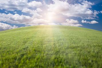 Image showing Green Grass Field, Blue Sky and Sun