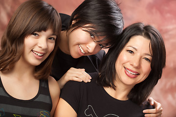 Image showing Attractive Multiethnic Mother and Daughters Portrait