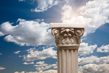 Image showing Ancient Replica Column Pillar Over Clouds and Sun