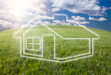 Image showing Dreamy House Icon Over Grass Field and Sky
