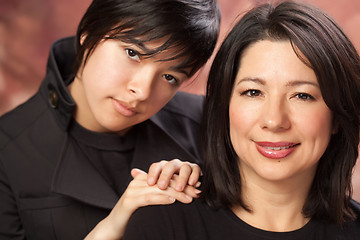 Image showing Attractive Multiethnic Mother and Daughters Portrait