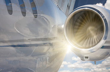 Image showing Private Jet Abstract with Sunburst