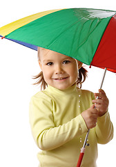 Image showing Cute child catching raindrops under umbrella