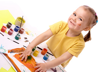 Image showing Cute child paint using hands