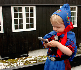 Image showing Toddler texting