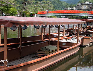 Image showing Boats and traditional bridge