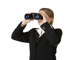 Image showing young business woman looking through binoculars