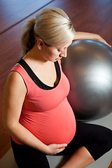 Image showing Pregnant woman doing relaxation exercise