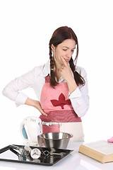 Image showing beautiful housewife preparing