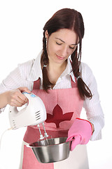 Image showing housewife preparing with kitchen mixer