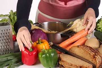 Image showing housewife preparing with diversity a food