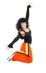 Image showing Very much exited woman dancer jumping