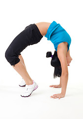 Image showing Woman holding bridge stretching pose