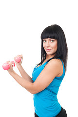 Image showing Happy woman practice with pink dumbbells