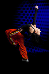 Image showing Dancer performing on dark background