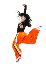 Image showing Dancer woman in jump look at camera