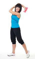 Image showing woman smile and exercise with dumbbell