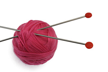 Image showing Red clew and knitting needles