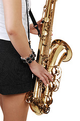 Image showing Chinese girl playing the saxophone.