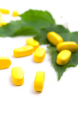 Image showing yellow vitamin pills