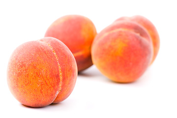 Image showing four peaches
