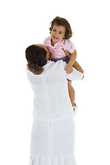 Image showing woman holding a happy girl