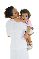 Image showing woman holding a cute girl