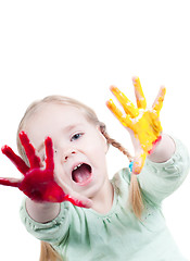 Image showing Little girl playing with colors