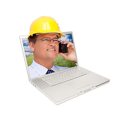 Image showing Laptop and Man with Hard Hat on Cell Phone