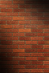 Image showing Red Brick Wall lit diagonally