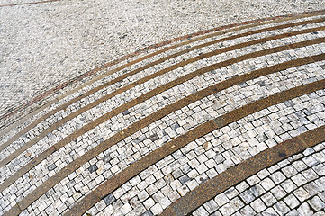 Image showing Old curved stone steps – cobblestones