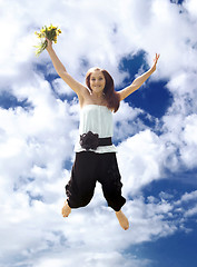 Image showing Young woman in jump