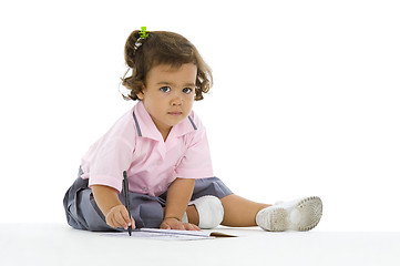 Image showing cute girl writing